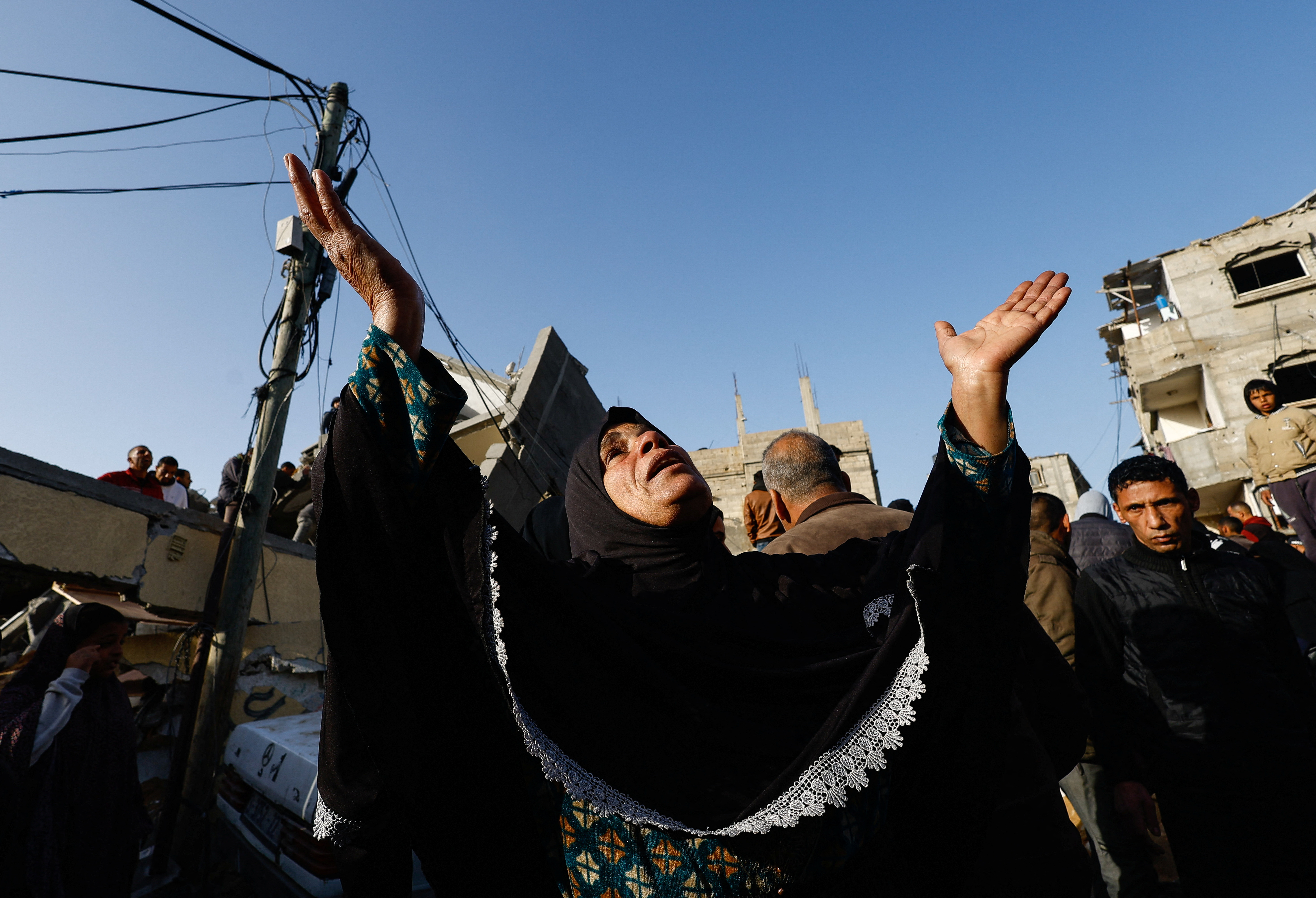 A Palestinian woman reacts at the site of an Israeli airstrike, amid the ongoing conflict between Israel and the Palestinian Islamist group Hamas, in Rafah in the southern Gaza Strip March 3