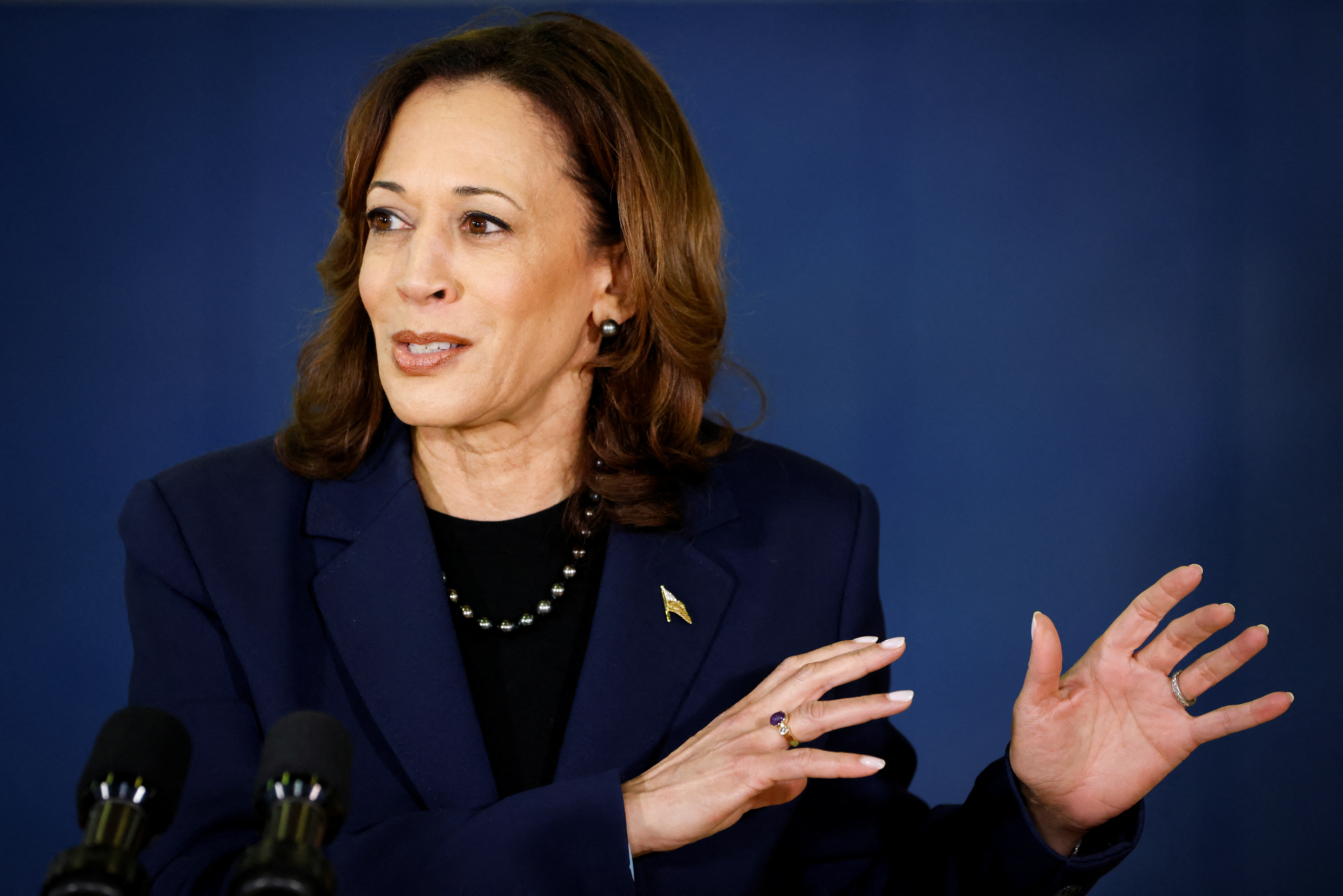U.S. Vice President Kamala Harris talks to the media