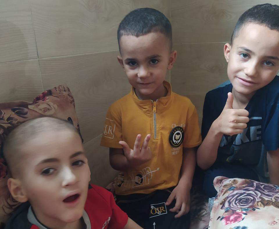 Yazan with his brothers