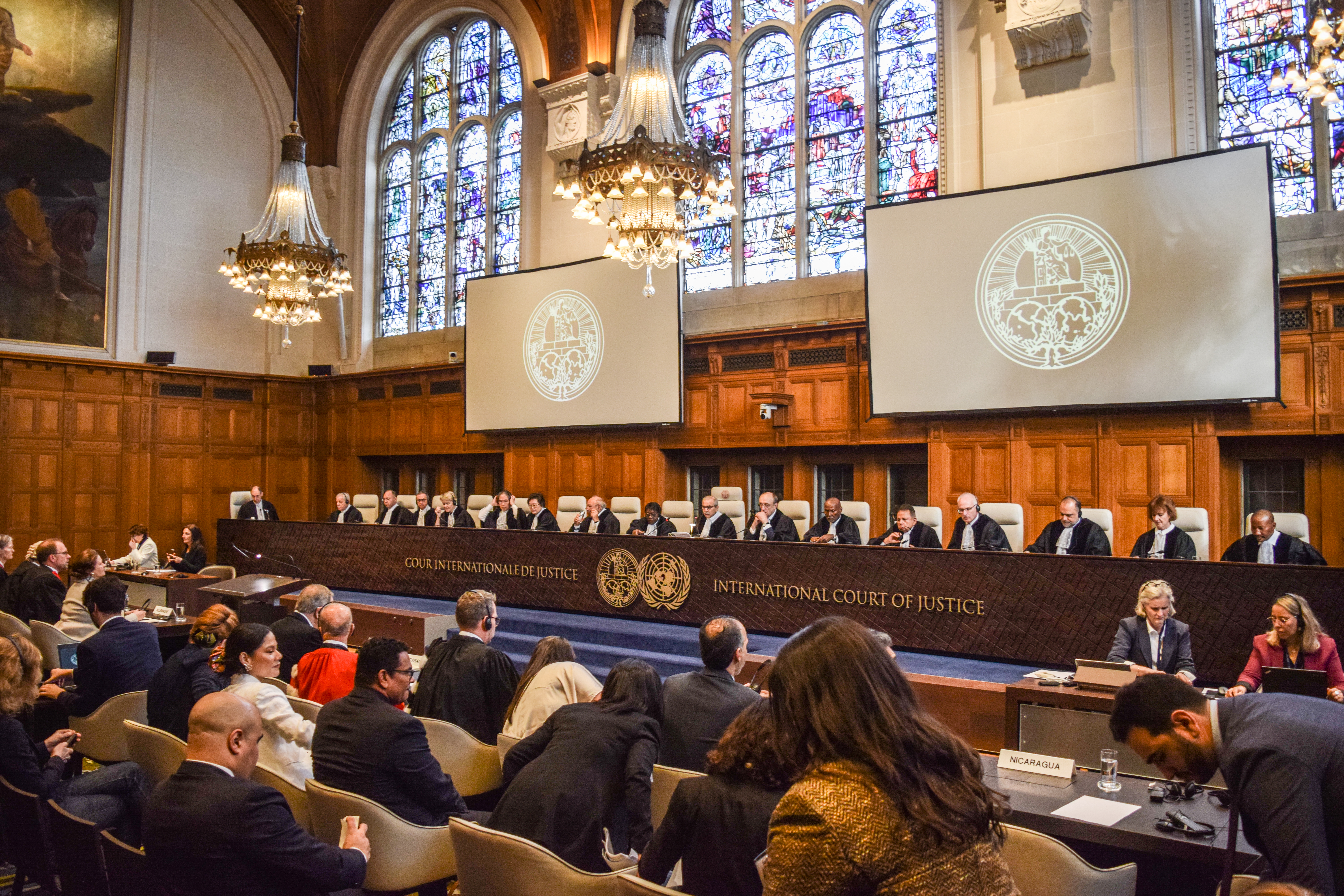 THE HAGUE, NETHERLANDS - APRIL 08: Judges entering the courtroom ahead of public hearing on Nicaragua’s claim that Germany aids Israel’s ongoing genocide in the besieged Gaza Strip at the International Court of Justice (ICJ) in The Hague, the Netherlands on April 08, 2024. Judge Nawaf Salam, the president of the International Court of Justice (ICJ), addressed the court. The case concerns alleged violations of the Genocide Convention of 1948 and the Geneva Conventions of 1949 pertaining to international humanitarian law in Palestinian territories. ( Mouneb Taim - Anadolu Agency )