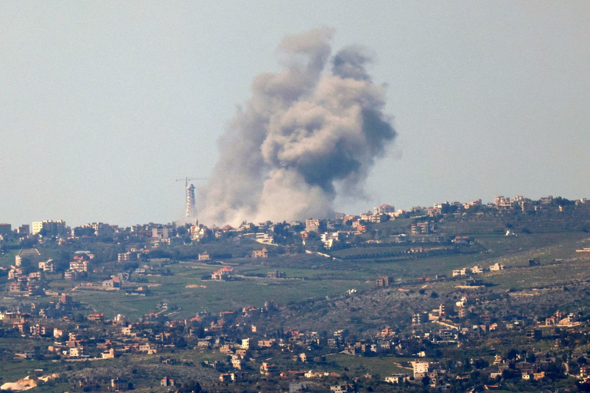This picture taken from Israel along the border with southern Lebanon shows smoke billowing above the Lebanese village of Bint Jbeil during Israeli bombardment